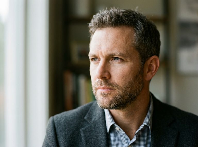 man with focused clear eyes looking ahead